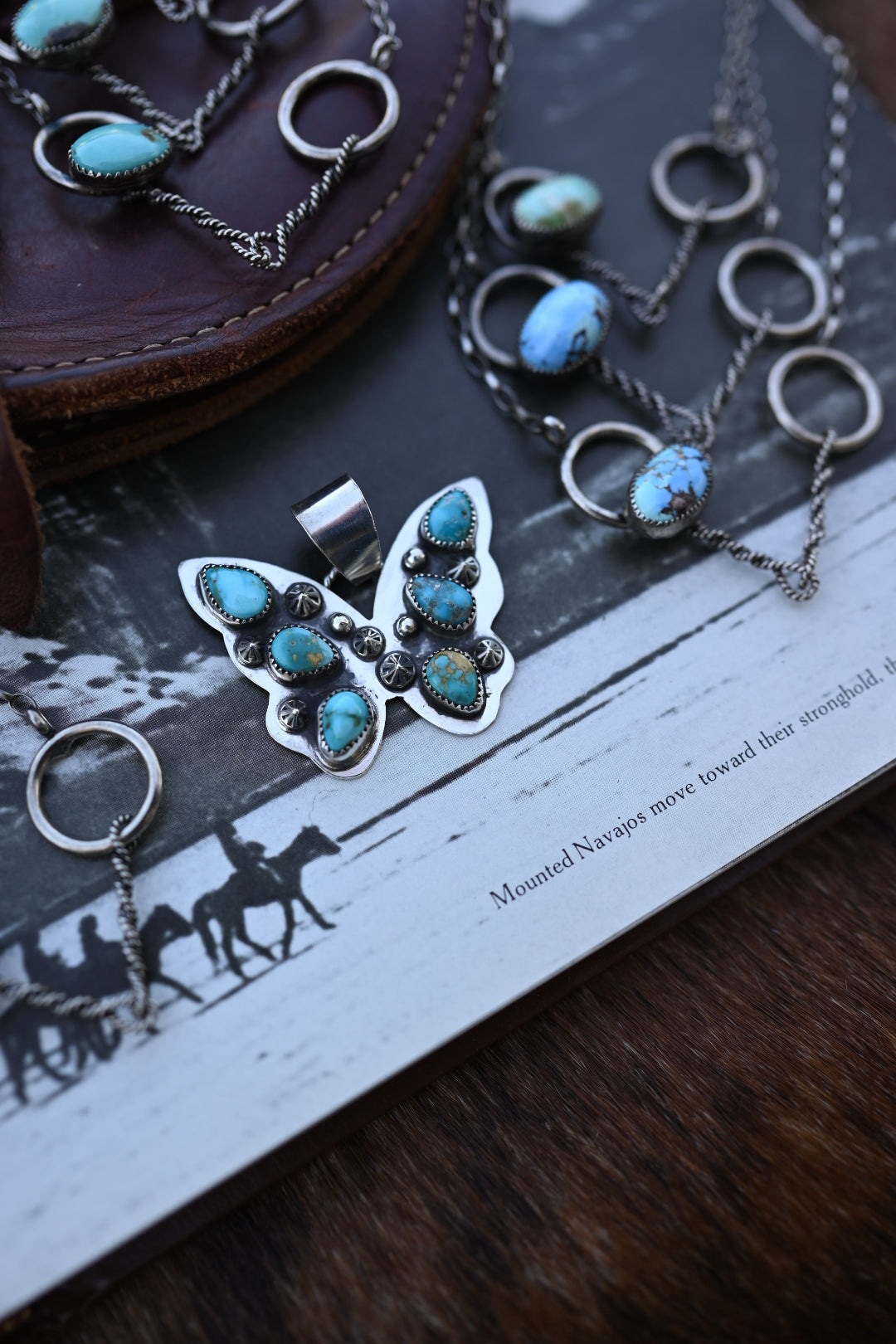 Butterfly Pendant 𐀔