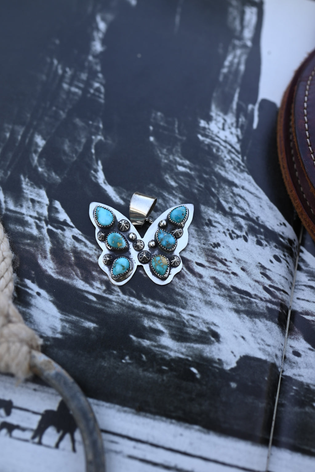 Butterfly Pendant 𐀔